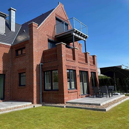 Haus Im Dorfgroden 14 Ferienwohnung Muschelsucher Wangerooge Luaran gambar